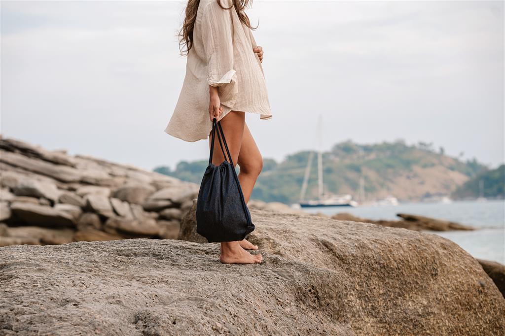 Impact AWARE™ recycled denim drawstring backpack - illuminated